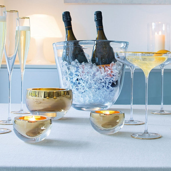 host bowls in gold at details by mr k