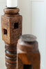 wooden candle holder with intricate carving at details by mr k