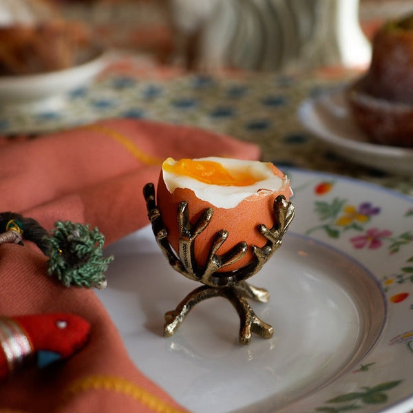 brass egg cups at details by mr k
